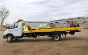 Эвакуатор Валдай с желтой платформой